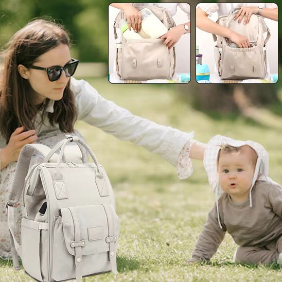 Maman assise sur l'herbe avec son bébé et un sac à langer beige, avec aperçu des compartiments intérieurs